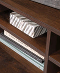 Close-up of Adjustable Shelf Library Hutch Space Saver Brown Industrial Style Desk Organizer And Bookshelf with books and box