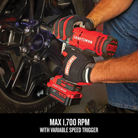 Man using Beast Half Inch Cordless Impact Wrench Bare Tool With Hog Ring Anvil, 350 Ft-Lbs Torque on a car tire, tool only visible.