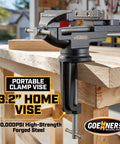 Front view of a 3.2-inch portable clamp-on bench vise mounted to a wooden workbench.