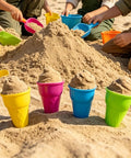 Epic Ice Cream Sand Toys Cone Mold Set For Beach And Backyard Play with colorful sand cones at the beach.