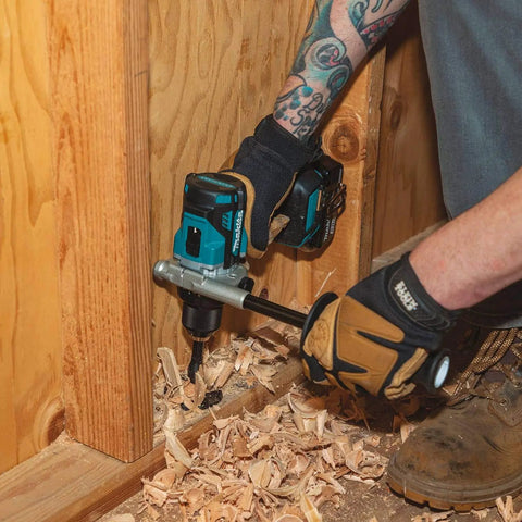 18V LXT Brushless Cordless Hammer Drill And Impact Driver Combo Kit in use on wood, showcasing Beast Mode Power and dual speed settings for tough jobs