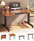 Massive 47 X 24 Inch Electric Standing Desk With 180 Degree Tiltable Mobile Rising Adjustable Height Workstation shown in office setup.