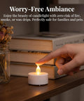 Hand touching Flameless Tea Lights Battery Operated Candles Set Of 24 LED Flickering Votive Candles for home decor on shelf
