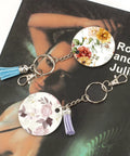 Heavy Duty Metal Lobster Claw Clasp Set With Key Rings And Clips For Crafting keychains with floral tags and tassels on a booklet