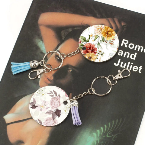 Heavy Duty Metal Lobster Claw Clasp Set With Key Rings And Clips For Crafting keychains with floral tags and tassels on a booklet