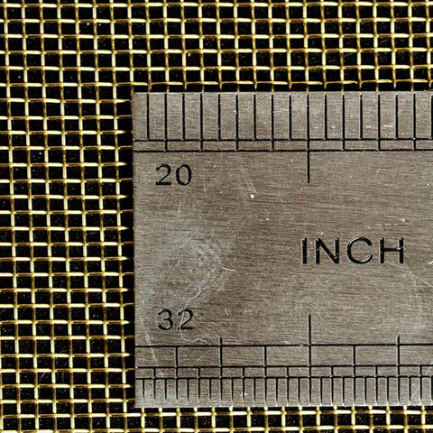 Close-up of brass mesh shielding fabric with a ruler, showing size details. Product: Brass Mesh Shielding Fabric For Industrial Filtration And Signal Screening Non Rustable Woven Wire Metal Mesh 100 By 100 cm Sheet Heavy Duty Versatile All Purpose Mesh Options From 20 To 500.