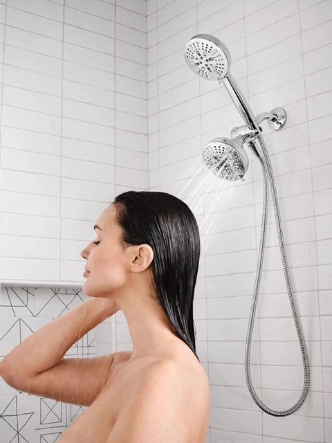 Woman enjoying High Pressure Dual Shower Head With Handheld Spray Eight Settings Chrome Finish Three Way Diverter Lets You Run Separate Or Combined Flow For A Custom Spa Like Shower Experience