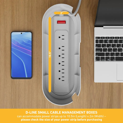 Top view of White Cable Management Box For Power Strips Up To 10.5 Inches with outlet and phone on wooden desk