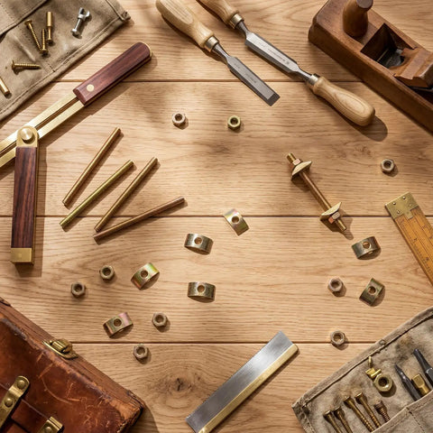 Woodworking tools and nuts on a wooden table, including Bed Frame Hardware Connector Kit 24 Sets M8x100mm Four In One Connectors.