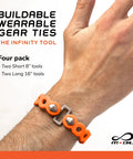 Infinity Tool Two Point Zero Modular Straps Four Pack Flexible Multi Tool Gear Strap on wrist, neon orange, buildable wearable gear ties.