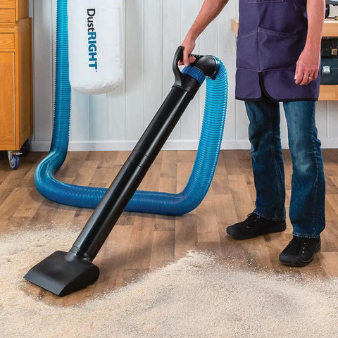 Person using 4 Inch Quick Change Floor Sweep Kit For Dust Collection With Quick Change Handle, Extension Wand, and Grate