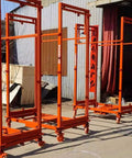 Built Tough Electric Lift Cart Heavy Duty Cargo Elevator Platform Anti Slip Deck, orange metal scaffolding with wheels.