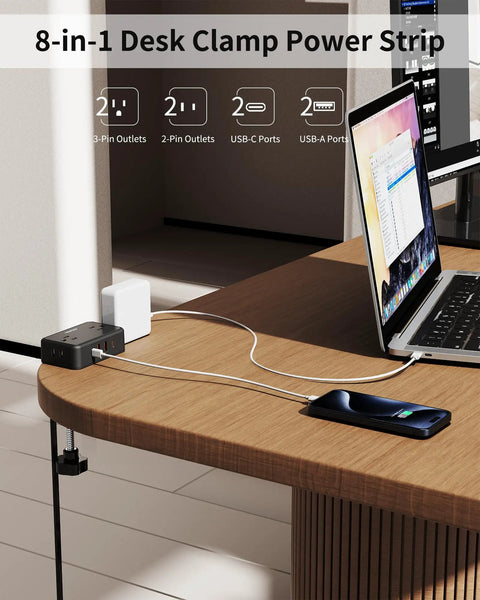 No Fuss 8 In 1 Desk Clamp Power Strip With 4 Outlets And 4 USB Ports, Includes 2 USB C, mounted on wood desk with charging phone