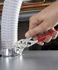 Hand using Adjustable Pliers Wrench With Quick Adjust Button And Parallel Jaws For Do It All Gripping Replaces A Full Set Of Spanners