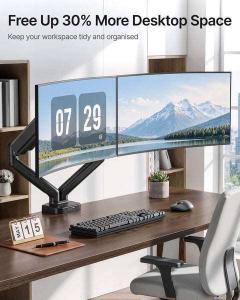 Heavy Duty Dual Monitor Arm Stand With Integrated USB Charging Ports Fits 17 To 32 Inch Screens Up To Nineteen Point Eight Pounds mounted on desk.