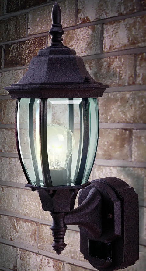 Six Sided Die Cast Aluminum Lantern With Beveled Glass Black Motion Activated Outdoor Light Mounted on Brick Wall
