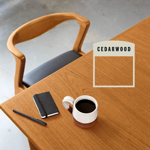 Fast Track Cedarwood Wood Stain For Home Updates One Pass Slick Protection Quick Cure applied on a wooden desk with coffee.