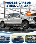 Beefy 7000 Lbs Portable Car Lift for Trucks, SUVs, and Sedans lifting a silver pickup truck, heavy duty scissor lift jack