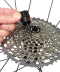 Using FR-5.2G Cassette Lockring Tool With Guide Pin For SRAM XX1 11 Speed Cassettes, Blue 5 mm on bike wheel