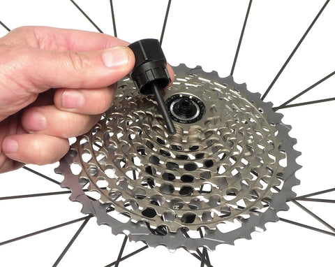 Using FR-5.2G Cassette Lockring Tool With Guide Pin For SRAM XX1 11 Speed Cassettes, Blue 5 mm on bike wheel