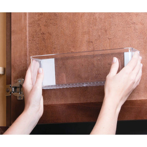 Hands installing Clear Plastic Wall Mount Organizer Shelf for Kitchen Bathroom Office Bedroom Garage and Craft Room 3 by 11 by 3.25 inches