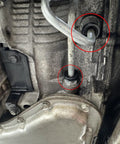 View of vehicle transmission showing Automatic Transmission Cooler Line Fittings Kit With Long And Short Connectors for Chevy leak fix