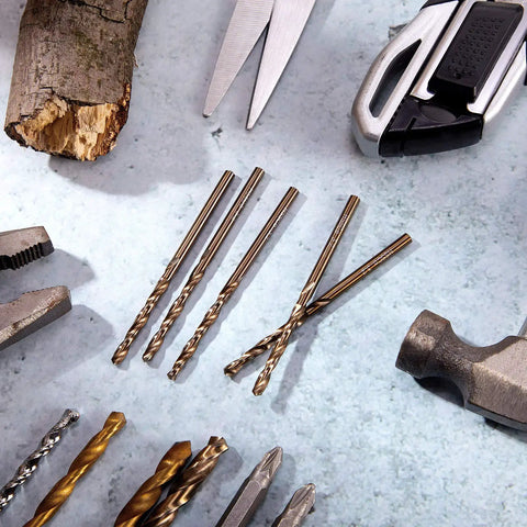 One Eighth Inch Cobalt Drill Bit Set 30 Piece M35 High Speed Steel Twist Bits alongside tools on workbench