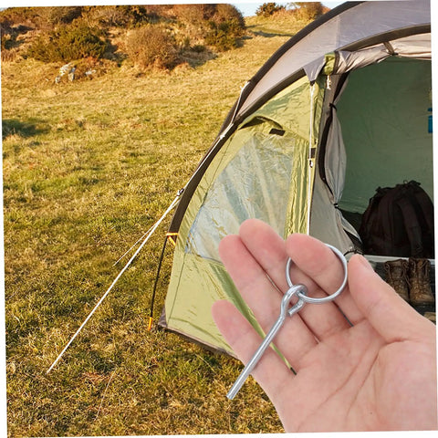 Person holding 10 Pack Tent Pole Connectors With Single Needle Ring For Quick Setup And Takedown near a camping tent.