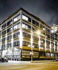 Building illuminated at night using Hella Bright LED Shoebox Corn Light Bulb For Outdoor Street And Security Lighting