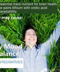Lithium Orotate 5mg Bioavailable Capsules That Boost Mood And Support Emotional Wellness Cognitive Function Memory And Behavior With Neurotransmitter Support 100 Capsules bottle next to a person lying in green grass.
