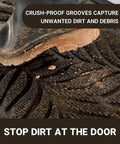 Boot stepping on All Season Waterproof Front Door Mat For Indoor Outdoor Use 29.5x17 Non Slip Doormat, showing leaf pattern.