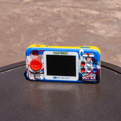 Front view of Street Fighter II Pocket Player Pro Handheld Console 2 In 1 Capcom Licensed Classics for retro gaming fans.