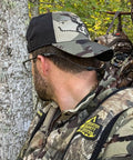 Man in camouflage with Monoz Adjustable Eyewear Retainer With Monofilament Like Line Off The Neck 14 Inch Black Non Conductive Eyewear Retainer