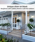 Rock Solid Two Step Handrails For Outdoor Stairs, Top Shelf Galvanized Steel Stair Guards with potted plants on a porch.