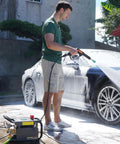 Man washing car using Beefed Up Electric Pressure Washer 100 Bar 2.3 GPM With PM Inverter 3HP Motor Horizontal Triplex Pump Ultra Quiet 65 Decibel