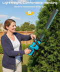 Woman using 22 Inch Cordless Hedge Trimmer With Dual Action Blade And 20V Power, Includes 2 Batteries And Charger, 180 Degree Rotating Handle