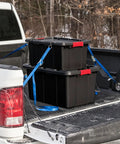 Heavy Duty Plastic Storage Totes With Secure Snap Lids For Garage Shed Organization 15 Gallon 18 Pack stacked in truck bed secured with straps.