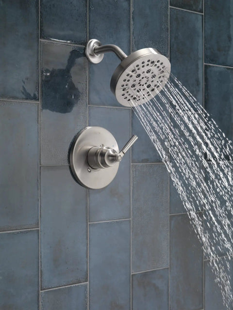 Saylor 14 Series Five Setting Shower Faucet Trim Kit in Brushed Nickel with stainless shower head on blue tiled wall