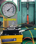 Close-up of Beast Mode Industrial Grade Air Hydraulic Pump With 10,000 PSI Power and 3 Meter Remote Control Line in use