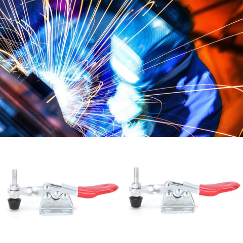 Heavy Duty Toggle Clamp 2 Pack Hold Down Fixture With Quick Clamping Tool For Welding Electronics And Equipment Installation 30 Kg Holding Capacity Sturdy Iron And Plastic Construction Ergonomic Handle, with worker welding in background