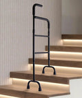 Premium Stair Assist Cane With 13 Adjustable Height Settings And Secure Non Slip Grip Making Daily Step Navigation And Outdoor Walkways Straight Up Smooth Sailing on wooden stairs.
