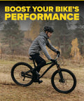 Cyclist on mountain bike with focus keyword: Set Of 2 24 Inch Bike Inner Tubes With Durable Butyl Rubber And Schrader Valve AV32.