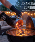 Person using Heat Resistant Fireplace Gloves 14 Inch Fireproof Leather for BBQ grill with charcoal and flames.