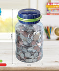 Digital Coin Counter Money Jar With LCD Display And Automatic Piggy Bank for US Coins, filled, on desk 8 inch x 4.5 inch, blue lid