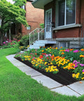 Heavy Duty Weed Barrier Ground Cover Fabric 6.5 Ft By 32 Ft Woven Landscape Weed Control Mat installed in garden bed