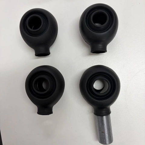 Beefed-Up Heavy Duty Five Eighth Inch Heim Joint Boots With High Temp Silicone Covers And Dust Seals For Off Road Suspension Systems, Rugged Rod End Protection Against Dirt Mud Sand, Heat Resistant And Anti Hardening, Four Pack, black silicone boots on white background