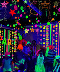 60 Feet UV Neon Streamers Glow Garland Kit For Parties and Events Hanging Blacklight Reactive Decor in party setting