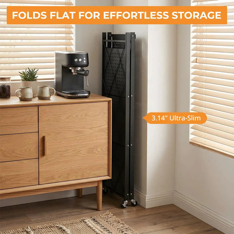 Heavy Duty 4 Tier Foldable Storage Shelf, Massive Rolling Wire Rack With Pivoting Casters, Dead Simple Tool Free Assembly, Total Game Changer Cube Organizer For Kitchen Pantry Garage Or Home Office, Black, folded compactly beside a coffee machine.
