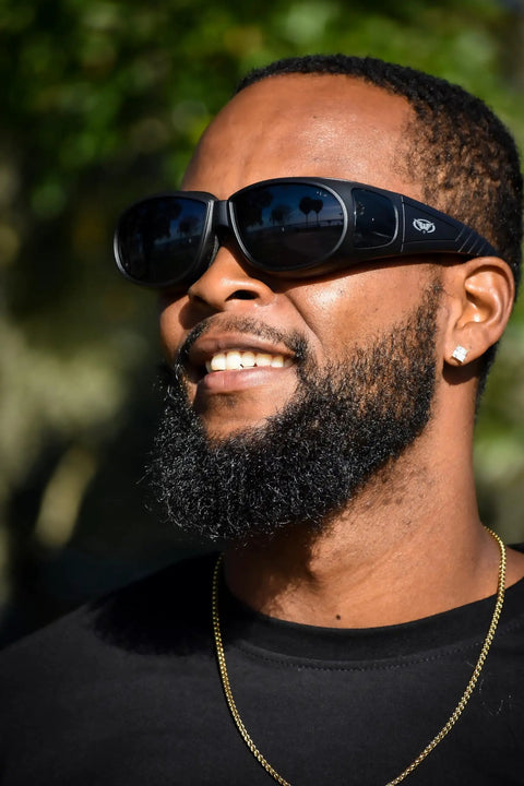 Person wearing Padded Motorcycle Safety Glasses That Fit Over Prescription Glasses, Anti Fog Coating, Smoke Lens