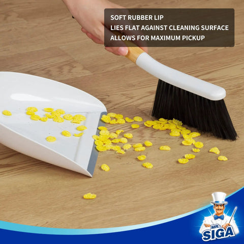 Portable Dustpan and Brush Set With Bamboo Handle in White For Quick Cleanups at Home or Office in use on wooden floor